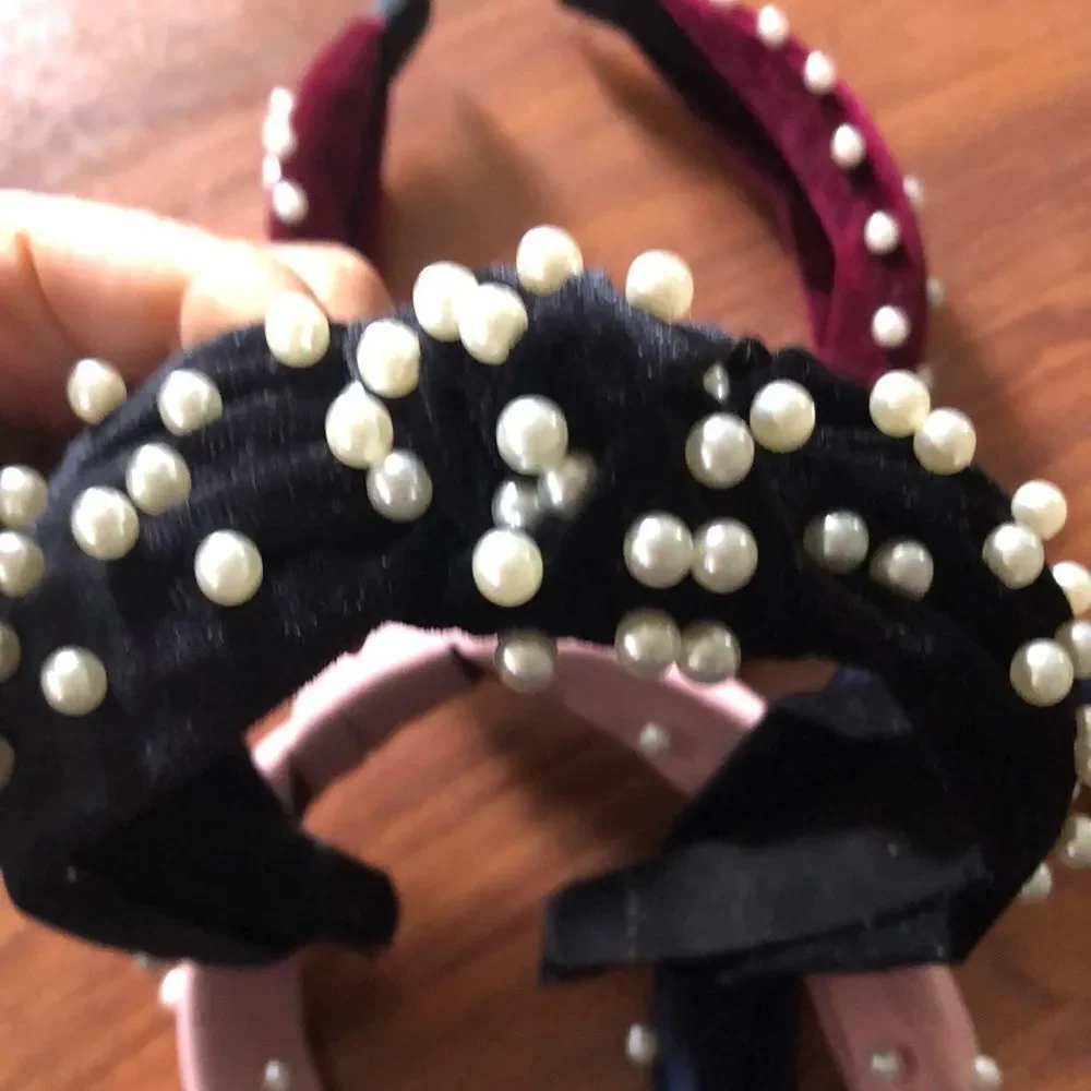 lot of pearl headbands. Velvet and chiffon.